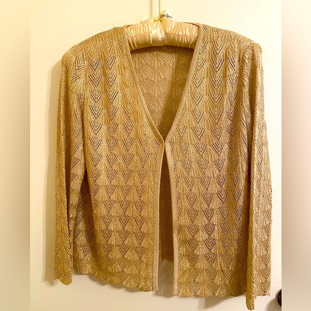 St. John Evening size 16.  Gold cardigan with eye and hook closure at top only.